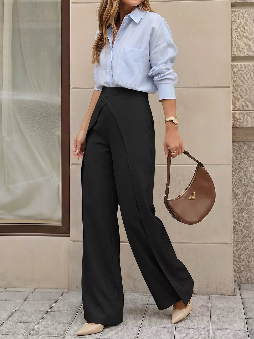 Side profile of black flowy silhouette pants showing elastic waistband while walking