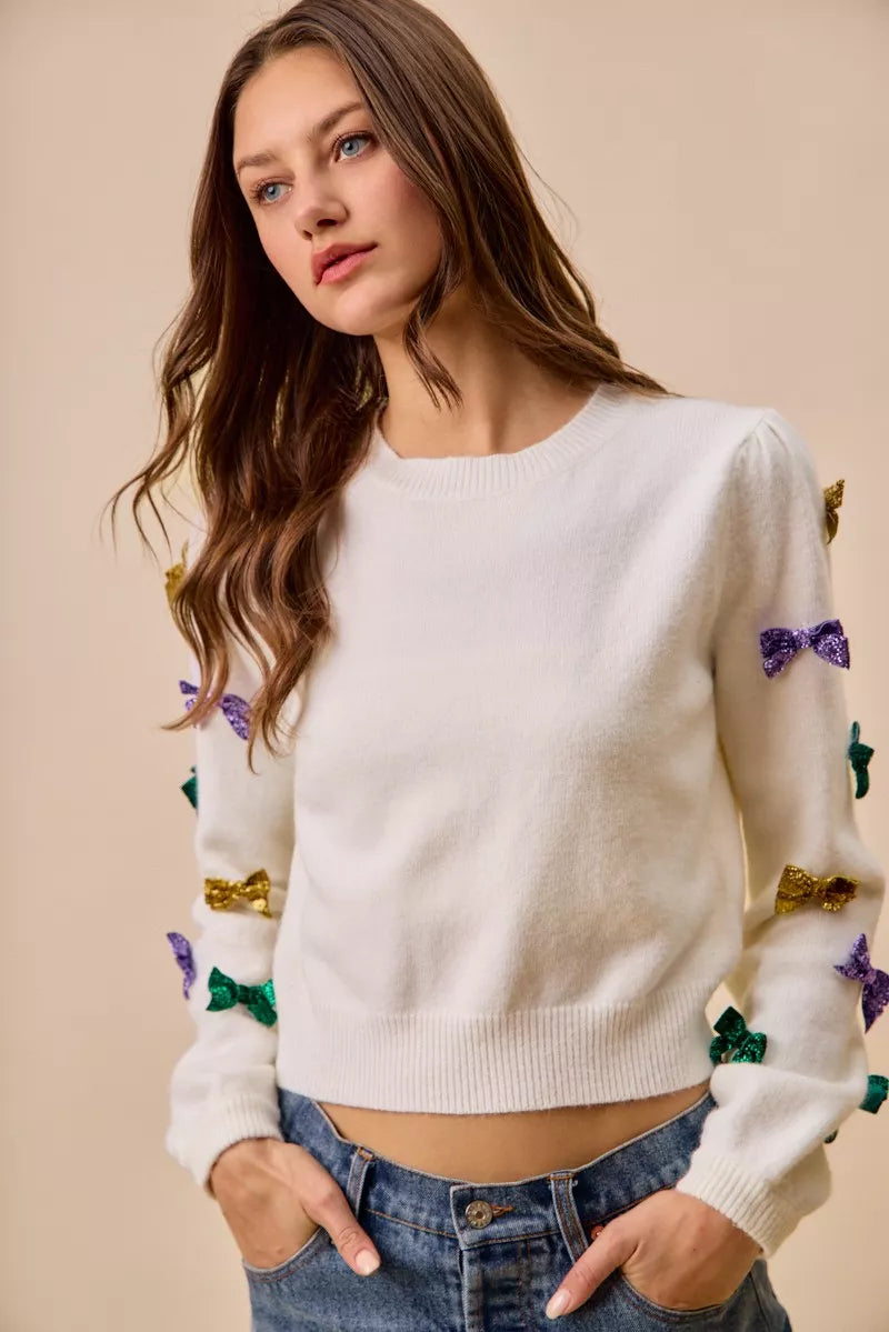 SO ME Sweater Knit Top Mardi Gras Glitter Bow Ribbon Ivory da7f7a0849434a87b5dc1f1bb9eb7e15-Max-Origin Trendsi