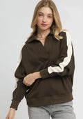 Espresso brown oversized polo sweatshirt with wide cream stripes on sleeves and V-neck placket