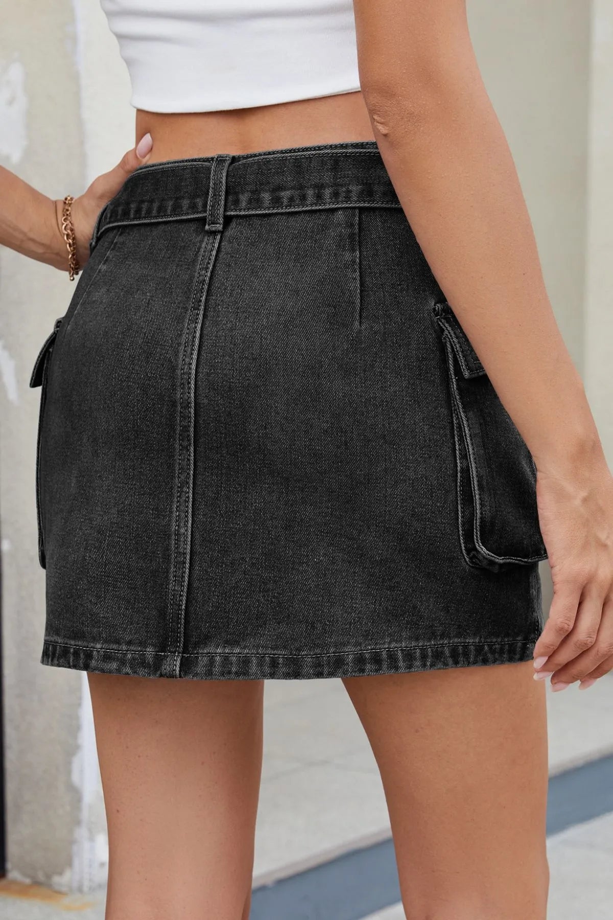 Denim Mini Skirt Criss-Cross Waist Detail with Crago Pockets Blue Black de28f262-904e-4841-aa23-733e3496de01-Max-Origin Trendsi