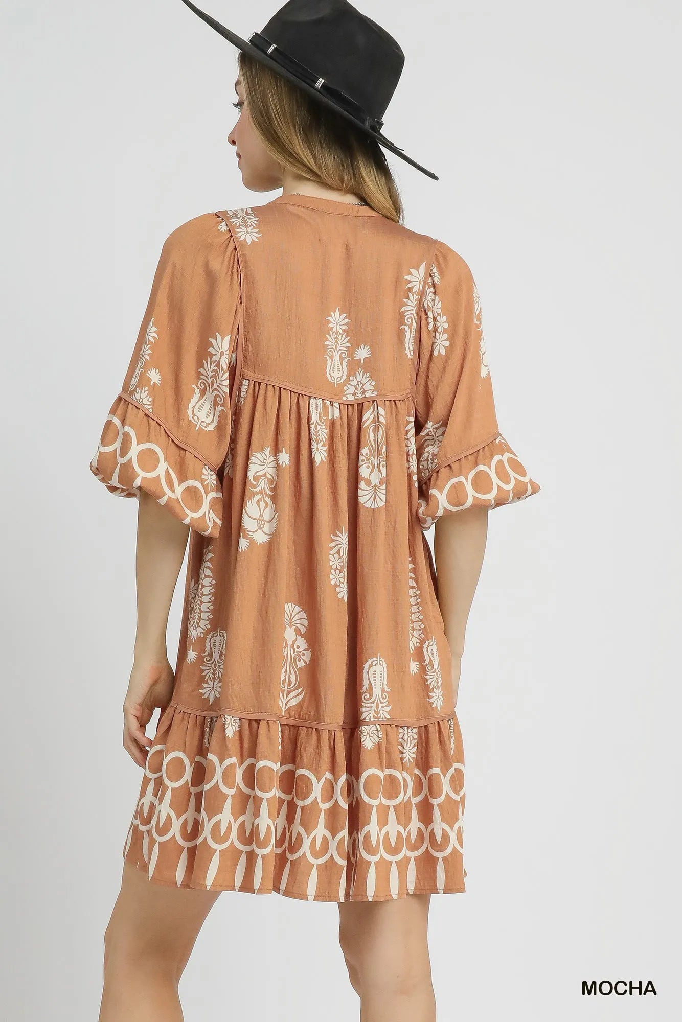 Umgee Mini Dress Mocha Boarder Print Tassel Tie Neck Ruffled e216dfc8-0336-46d2-addf-22f70b2686c8-Max-Origin Trendsi