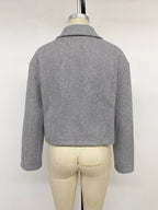 Rückansicht der grauen melierten Perfee Zip-Up Shacket am Mannequin mit strukturiertem Kragen, langen Ärmeln und geradem Polyester-Saum