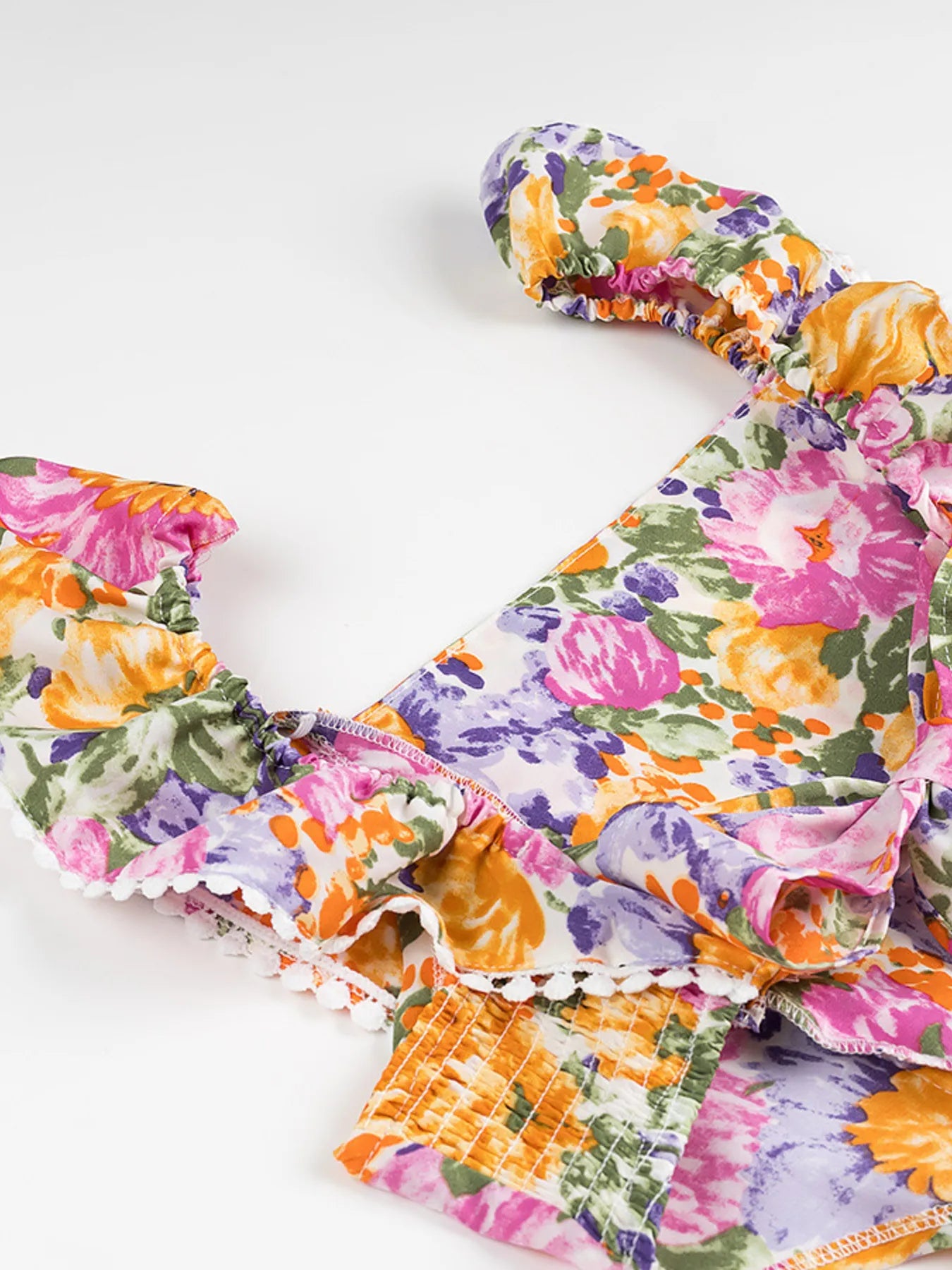 Floral Mini Dress Colorful Print Ruffled Hem Cutout Bow Tied Backless e8ae7c837da84ac6a301f26a4ba31dbb-Max-Origin Trendsi