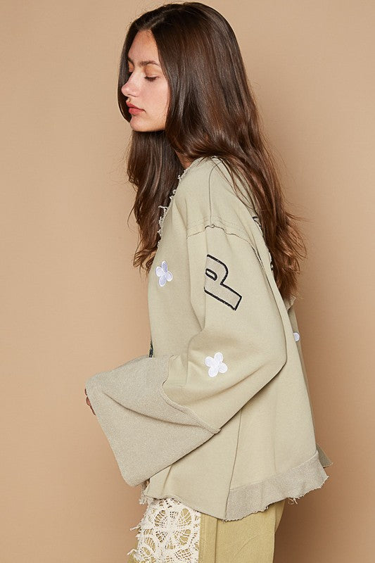 POL V-Neck Top Peace Round Patch Embroidered Exposed Seam Back Ruffle e8fcfb2c-6bd4-47e0-9cdf-9579c49d65ab-Max Trendsi