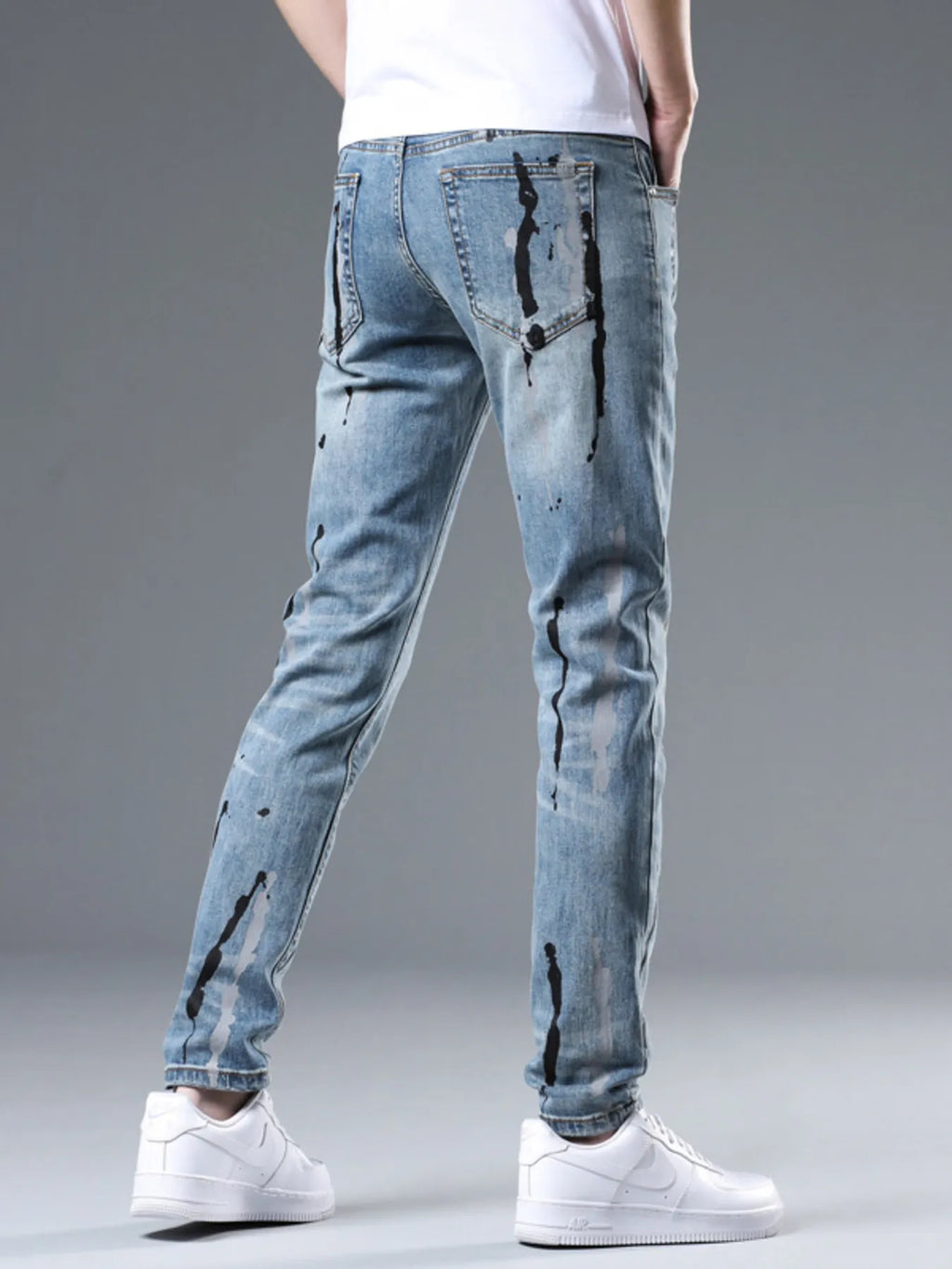 Men's Slim Fit Jeans Splatter-Paint Style Distressed Ligh Blue Denim Pants ea3215ed545f402497bdbf7fe588e0c5-Max-Origin Trendsi