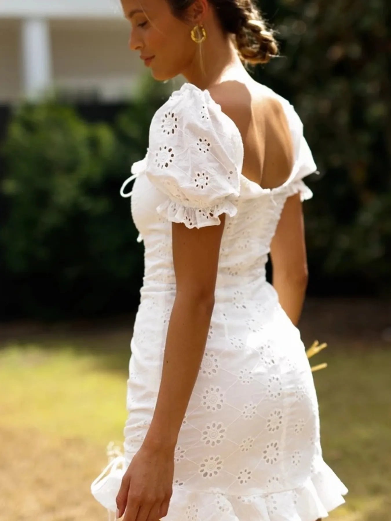 Crochet Mini Dress Cotton White Eyelet Ruffled Hem Lace Up Tied Neck fd2a1e88a2334a149cc6ed7c4b9a133d-Max-Origin Trendsi