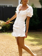 Crochet Mini Dress Cotton White Eyelet Ruffled Hem Lace Up Tied Neck fd9f5c3ff6ce4392a0c6f023930825b8-Max-Origin Trendsi