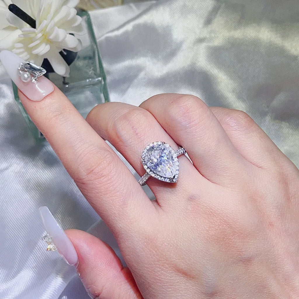 Silver Ring 2 Carat Moissanite White Teardrop Stone 925 Sterling Jewelry feee34f0-4384-4e23-bb03-6a0e241ef488-Max-Origin Trendsi