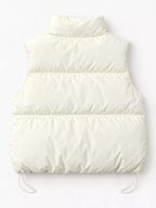 Back view of cream quilted vest with horizontal seams and symmetrical drawstrings